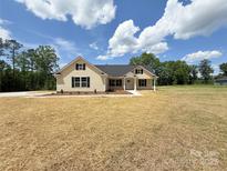 Charming single-Gathering home featuring black shutters and a spacious, open front yard at 3650 Sentry Rd, Lancaster, SC 29720