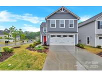 Two-story home with gray siding, white trim, a bright red front door, and an attached white two-car garage at 3212 Coast Oak Rd, Charlotte, NC 28214