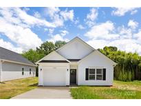 Charming single-story home with a manicured lawn and inviting front porch, creating a welcoming curb appeal at 220 S Columbia St, Gastonia, NC 28054