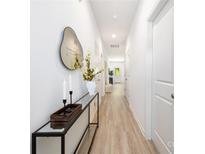 Bright hallway featuring a console table with mirror, décor and stylish flooring at 220 S Columbia St, Gastonia, NC 28054