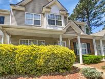 Charming exterior of home showcasing a well-maintained lawn and pleasant architectural details at 6457 Saint Bernard Way, Charlotte, NC 28269
