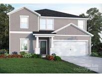 Charming two-story home featuring a gray exterior, landscaped front yard, and an attached two-car garage at 1505 Harper Landing Blvd, Stanley, NC 28164