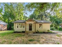 Charming bungalow-style home featuring a quaint front yard and inviting entryway at 370 Old Camden Rd, Lancaster, SC 29720