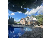 Gorgeous backyard pool and deck area perfect for entertaining and relaxation at 504 Johnsfield Rd, Shelby, NC 28150