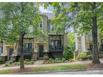Charming townhome with beautiful landscaping and covered balcony at 738 Garden District Dr, Charlotte, NC 28202