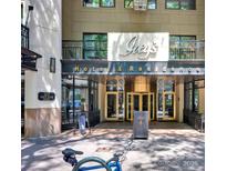 An attractive hotel and residence exterior showcasing an upscale establishment in an urban setting at 127 N Tryon St # 404, Charlotte, NC 28202