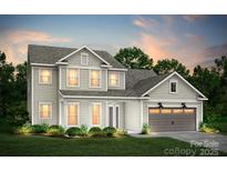 Charming two-story home with well-maintained landscaping and attached two-car garage at 13940 Penbury Ln # 402, Charlotte, NC 28278