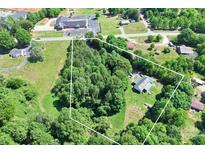 A high angle of the property showing surrounding greenery and the home's location on a generous, private lot at 4155 Slanting Bridge Rd, Sherrills Ford, NC 28673