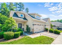 Charming home with a two-car garage, well-manicured lawn, and delightful curb appeal, perfect for suburban living at 204 Aztec Cir, Mooresville, NC 28117