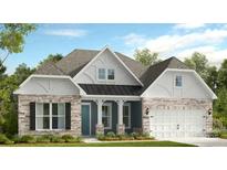 Charming single-Gathering home with stone accents, a covered entryway, and an attached two-car garage at 3018 Tramore Dr, Harrisburg, NC 28075