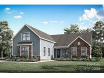 Charming craftsman-style home with stone accents and a beautifully landscaped front yard at 1634 Dresden Dr, Rock Hill, SC 29732