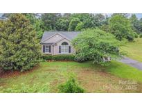 Charming home featuring a well-manicured front yard and inviting curb appeal at 2906 Chapman Cir, Rock Hill, SC 29732