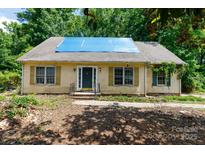 Charming single-Gathering home featuring a yard and classic architectural details at 3316 Fairhaven Rd, Rock Hill, SC 29732