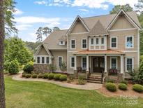 Beautiful two-story home with a manicured front lawn and inviting entrance at 270 Kemp Rd, Mooresville, NC 28117