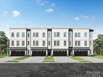 Modern townhome showcases a three-story facade with a private garage at 2134 Barrowcliffe Nw Dr # 0006, Concord, NC 28027