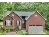 Charming brick home with attached garage and inviting front entrance at 7328 S Providence Rd, Waxhaw, NC 28173