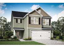 Charming two-story home featuring a two-car garage and welcoming front lawn at 3334 Strong Box Ln, Gastonia, NC 28052