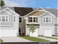 Charming townhome featuring a one-car garage, neutral siding, and a well-manicured lawn at 7108 Hodges Meadow Ln, Charlotte, NC 28213