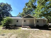 Charming single-story home with a covered front porch and a well-maintained yard at 345 Mountain View St, Gastonia, NC 28052