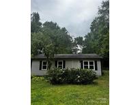 Charming single-story home with a well-maintained lawn and fresh exterior paint at 3079 Reservation Rd, Rock Hill, SC 29730