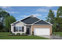 Charming single-story home featuring brick and siding accents, a two-car garage, and manicured landscaping at 3019 Sassafras Trl, Gastonia, NC 28056