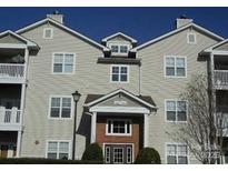 Inviting multi-Gathering condo with neutral siding, and manicured landscaping at 10673 Hill Point Ct, Charlotte, NC 28262