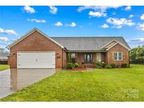 Charming single-story brick home with a well-manicured lawn and a two-car garage at 4336 Hunter Rhyne Rd # 9, Lincolnton, NC 28092