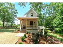 Charming home with a welcoming front porch, steps, and landscaped surroundings at 2268 New Gray Rock Rd, Fort Mill, SC 29708