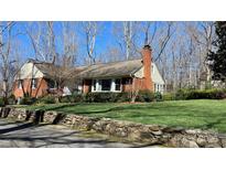 Charming single-Gathering home features a well-maintained lawn, stone wall, and mature trees offering shade and privacy at 700 Valleyview Dr # 1, Albemarle, NC 28001
