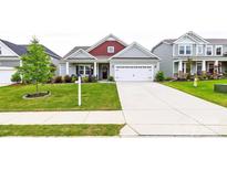 Charming single-Gathering home with well-manicured lawn and two-car garage on a sunny day at 4046 Starfire Ln, Rock Hill, SC 29732