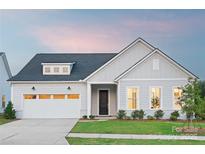 Charming single-Gathering home with a well-manicured lawn and a two-car garage at 4209 Pinekirk Dr # 374, Charlotte, NC 28269