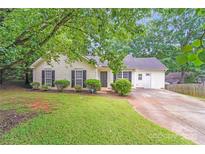 Charming single-story home with a well-maintained lawn and mature trees at 6216 Bandy Dr, Charlotte, NC 28227
