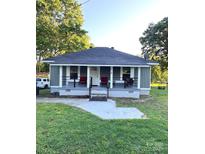 Charming single-story home with a cozy front porch and well-maintained lawn at 918 8Th St # 5, Lancaster, SC 29720