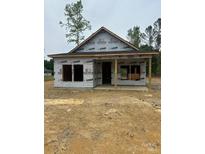 Unfinished home featuring a covered front porch, ready for your custom touches at 128 Loblolly Dr, Mount Gilead, NC 27306