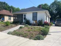 Charming single-story home with a screened-in porch and walkway at 1418 Old Wilkesboro Rd, Salisbury, NC 28144
