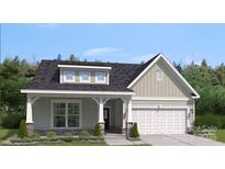 Charming single-Gathering home featuring stone accents and a two-car garage at 2045 Mantle Ridge Dr, Indian Trail, NC 28079