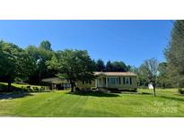 Charming single story home featuring a spacious yard and covered carport, perfect for outdoor living at 3132 7Th Se Ave, Conover, NC 28613