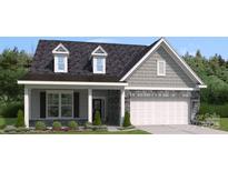 Charming single-Gathering home with stone accents, gray siding and a welcoming front porch at 5107 Raging Creek Dr, Indian Trail, NC 28079