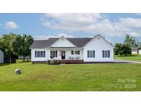 Charming single-story home with a welcoming front porch and well-manicured lawn at 170 Wagon Wheel Way # 4, Salisbury, NC 28147