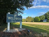 Wildwood Acres entrance sign provides a warm welcome to this desirable neighborhood at 295 Rendleman Rd, Salisbury, NC 28146