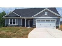 Charming single Gathering home with a two-car garage and stone accents along the base at 230 Mountain Island Dr # 39, Statesville, NC 28677