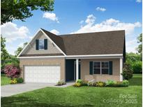 Inviting brick home with a two-car garage, lush lawn, and lovely landscaping at 123 Prestwick Way # 42, Mooresville, NC 28115