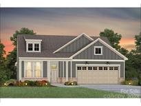 Charming single-Gathering home with craftsman details, a covered porch, and a two-car garage at 1022 Paddlers Way # 136, Belmont, NC 28012