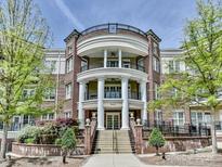 A stately brick building with white columns and manicured landscaping provides an attractive facade at 5425 Closeburn Rd, Charlotte, NC 28210