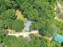 Aerial view of house nestled among lush trees, surrounded by nature at 615 Hawley Rd, McConnells, SC 29726