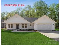 Charming one-story home featuring a two-car garage, well-manicured lawn, and classic architectural details at 834 Westminster Dr, Statesville, NC 28677