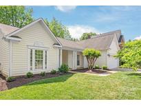 Charming home featuring a manicured lawn and meticulously landscaped front yard at 936 Knightsbridge Rd, Fort Mill, SC 29708