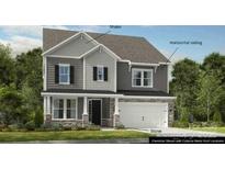 Charming two-story home with shake and horizontal siding, complemented by stone accents on the facade at 108 Goorawing Ln, Mooresville, NC 28115