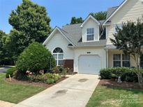 Charming home featuring a well-manicured lawn and an attached garage with a concrete driveway at 3071 Des Prez Ave, Fort Mill, SC 29707