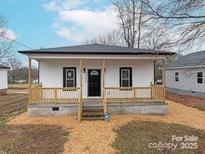 Charming single-story home featuring a cozy front porch and freshly painted exterior at 3346 York Hwy, Gastonia, NC 28052